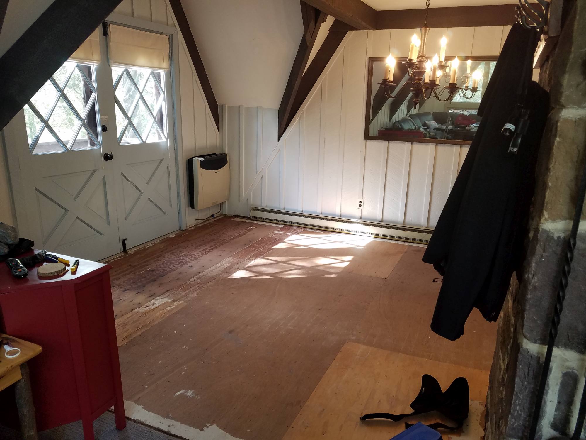 DIY Farmhouse Wide Plank Floor Made From Plywood - The Dining Room Subfloor With Staples Removed