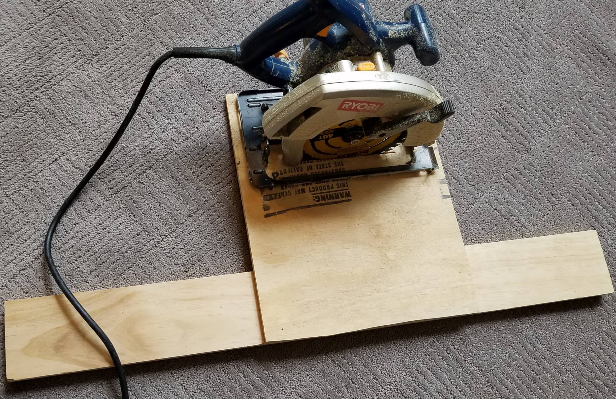 DIY Rustic Wide Plank Plywood Flooring - Secure The Jig To The Circular Saw Using Screws